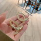 Women’s Elegant Twisted Gold Hoop Earrings